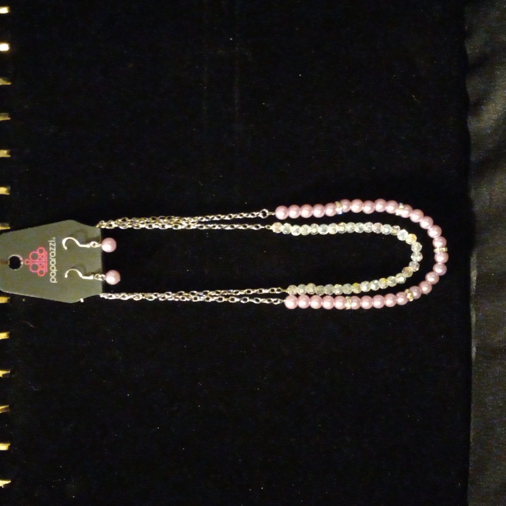 2 layer necklace by paparazzi with the matching earrings. 16" chain. Pink beads